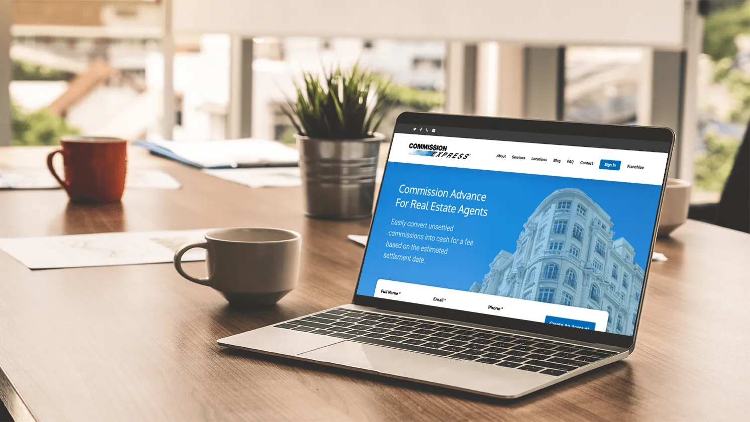 Redesigned Commission Express homepage on a laptop, headlined Commission Advance For Real Estate Agents with an account sign-up form